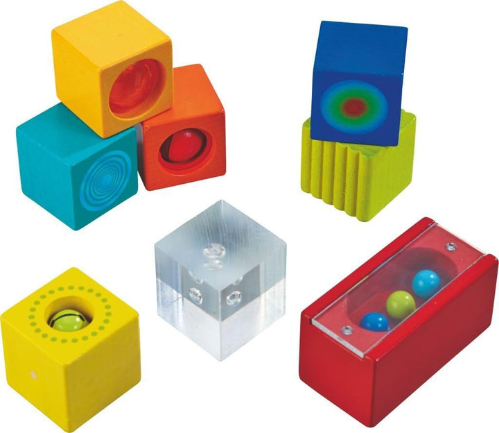 HABA Entdeckersteine Farbenspass – Sensorikspielzeug für Kinder ab 12 Monaten – 6 Bunte Würfel mit v