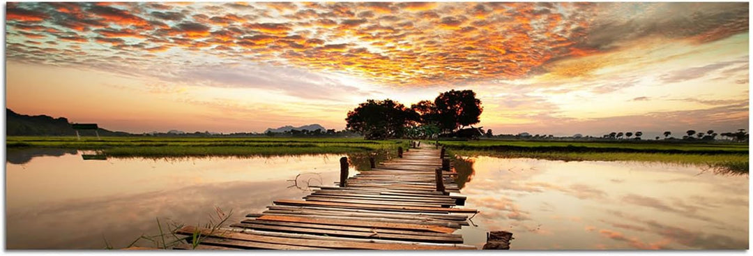 Augenblicke Wandbilder Leinwandbild als Panorama in 150x50cm Tropen Fluss Steg Sonnenuntergang Wolke