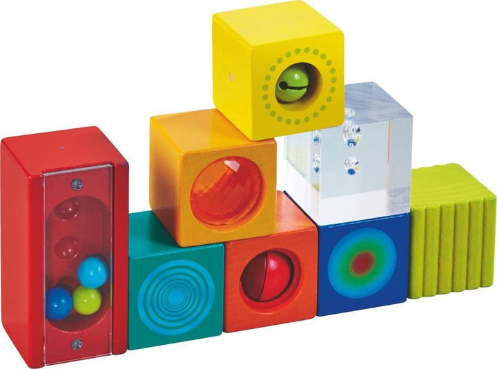HABA Entdeckersteine Farbenspass – Sensorikspielzeug für Kinder ab 12 Monaten – 6 Bunte Würfel mit v