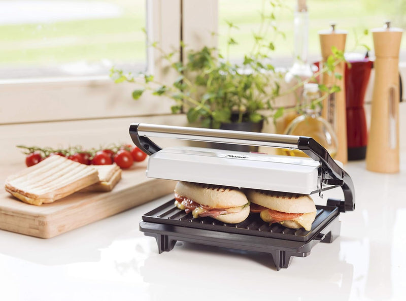 Bestron Kontaktgrill mit Auffangschale, Sandwichmaker mit Cool-Touch-Handgriff, Paninimaker mit Anti