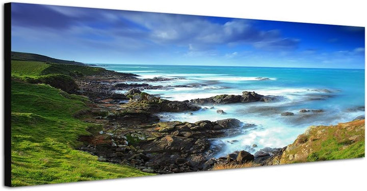 Paul Sinus Art Panoramabild auf Leinwand und Keilrahmen 150x50cm Neuseeland Küste Wiese Meer Wolken