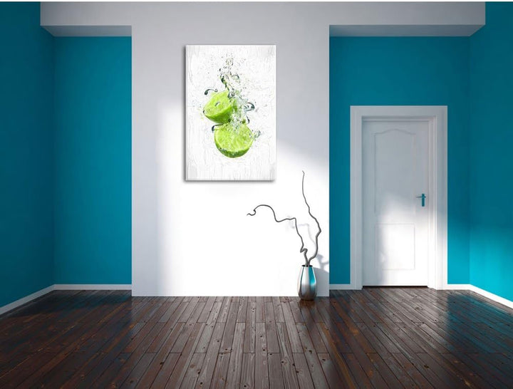 Pixxprint Limette fällt in Wasser / 100x70cm Leinwandbild bespannt auf Holzrahmen/Wandbild Kunstdruc