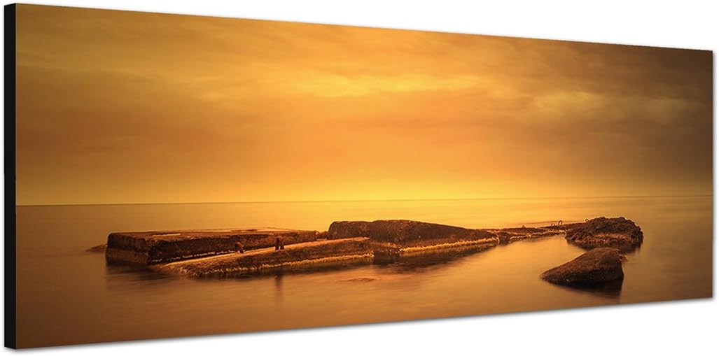 Paul Sinus Art Panoramabild auf Leinwand und Keilrahmen 150x50cm Meer Steine Nebel Sonnenaufgang