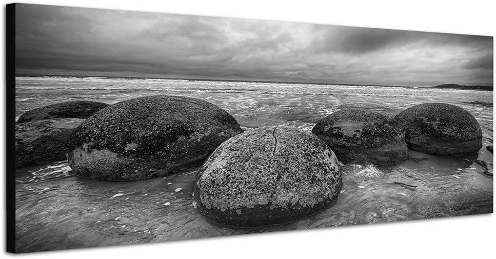 Paul Sinus Art Panoramabild auf Leinwand und Keilrahmen 150x50cm Neuseeland Steine Meer Strand schwa