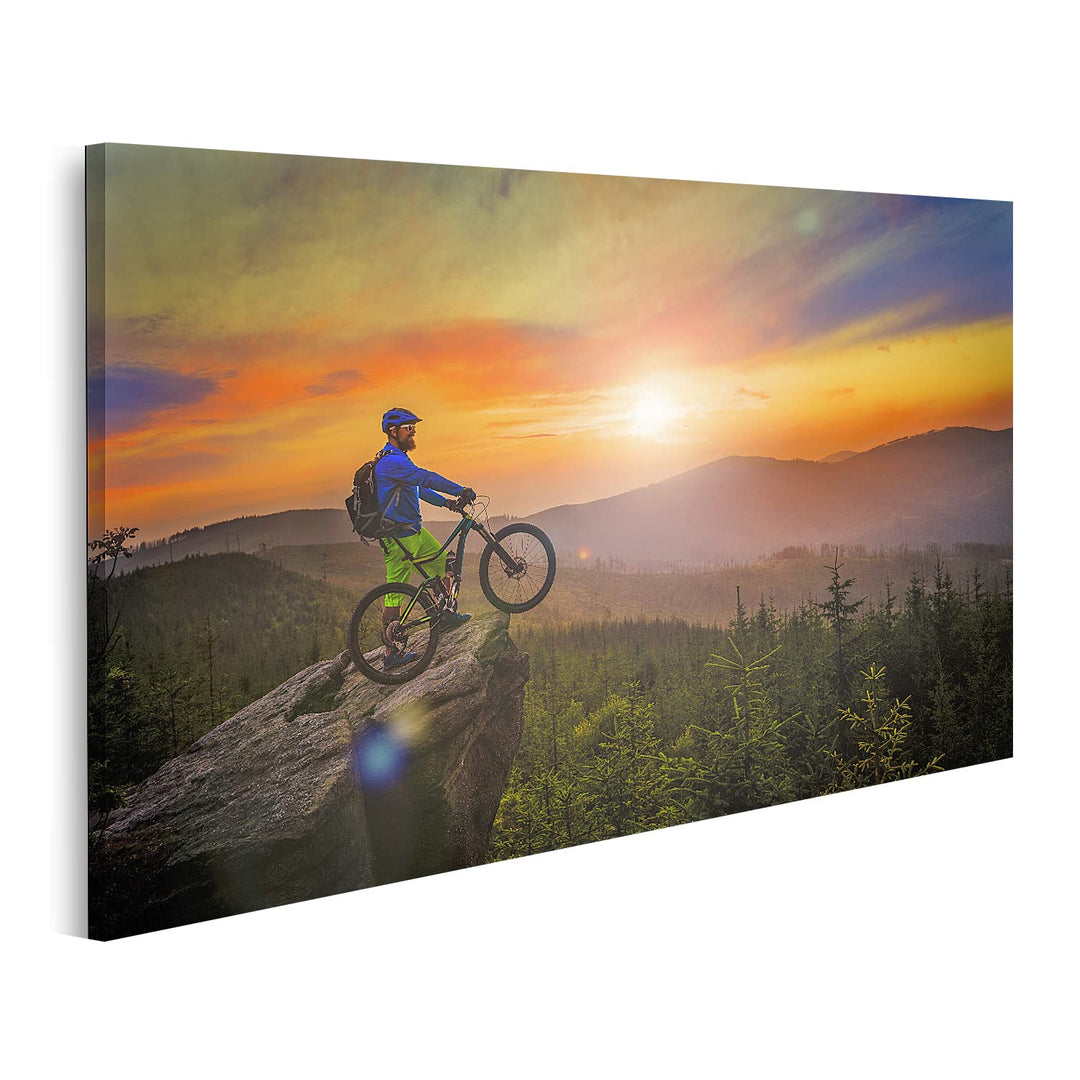 islandburner Bild auf Leinwand Mountainbiker Sonnenuntergang auf Fahrrad MTB Cross Country Downhill