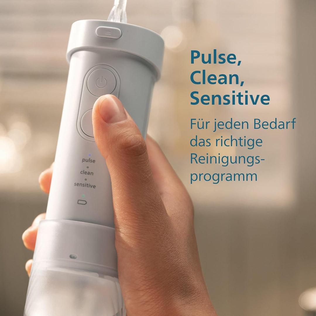 Philips Sonicare Compact Flosser 1000, tragbare Munddusche mit 3 Reinigungsprogrammen, IPX7 wasserdi