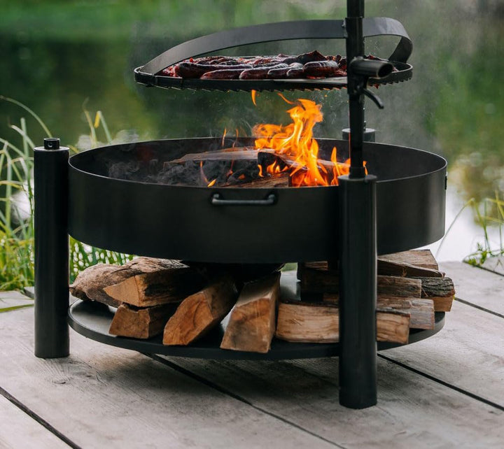 CookKing Feuerschale Montana X 60 mit Holzlager und Zubehör aus Rohstahl Ø 60 cm handgeschweisst wet