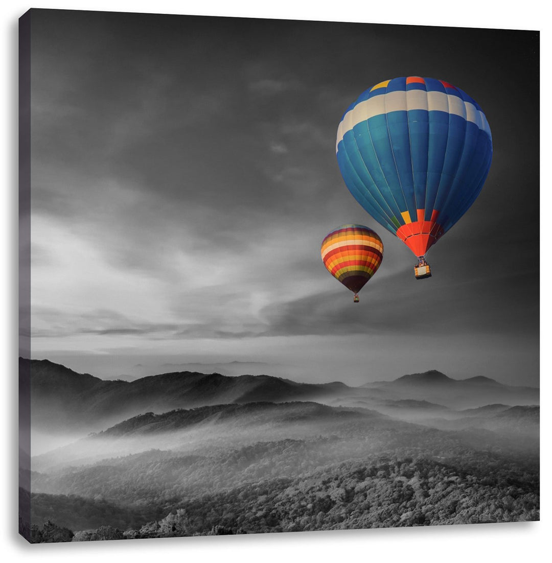 Pixxprint Heissluftballons über den Wäldern der Alpen schwarz/weiss, Format: 70x70 auf Leinwand, 70x