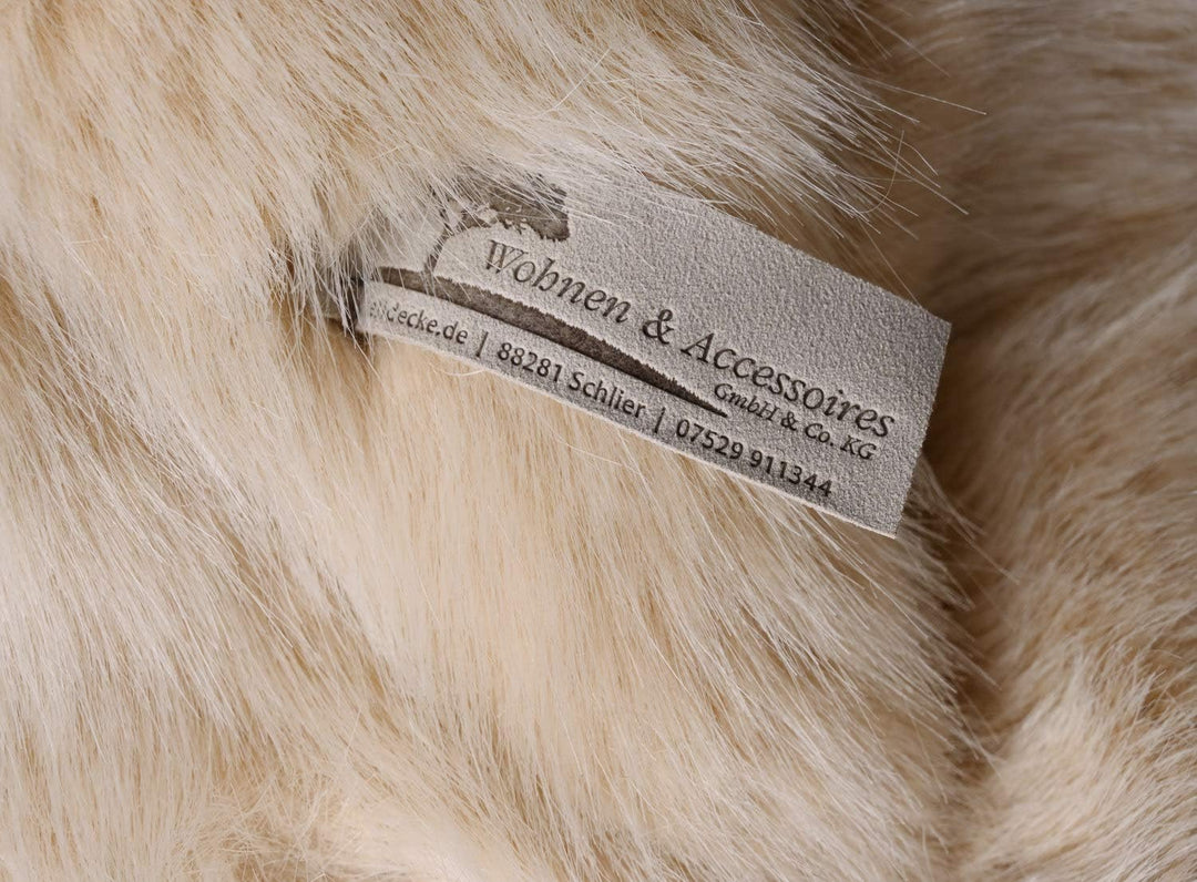 Wohnen &amp; Accessoires GmbH &amp; Co. KG Edelste Premium Felldecke aus Webpelz Sandrose 150x200cm (