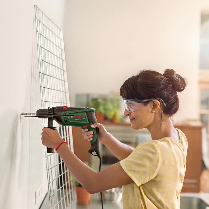 Bosch Schlagbohrmaschine UniversalImpact 730 (Präzisionsbohren in Mauerwerk, Holz und Stahl; 730-Wat