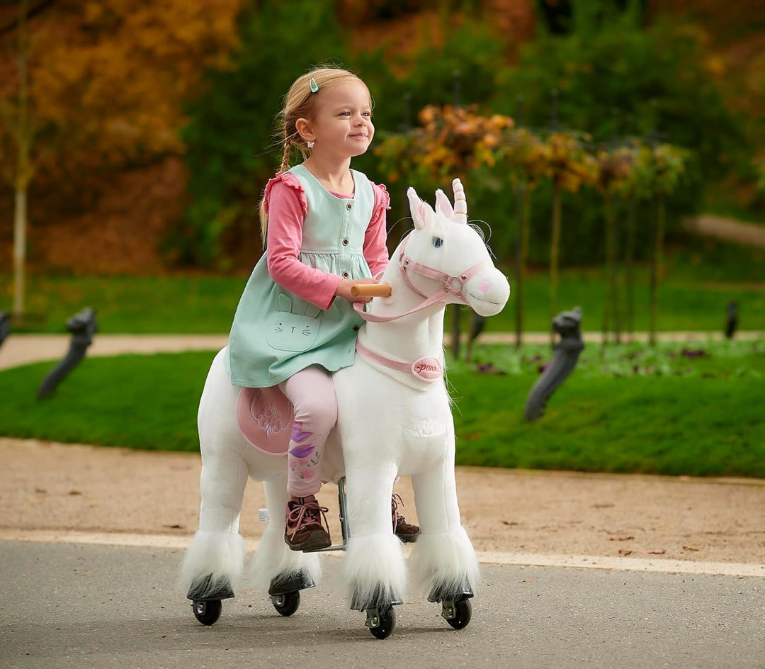 PONNIE Einhorn mit Rollen S (3-6 Jahre), Unicorn zum Reiten mit Abnehmbarer Rosa Sattel und Halfter