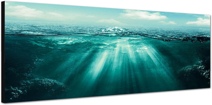 Paul Sinus Art Panoramabild auf Leinwand und Keilrahmen 150x50cm Meer Welle Unterwasser Sonnenstrahl