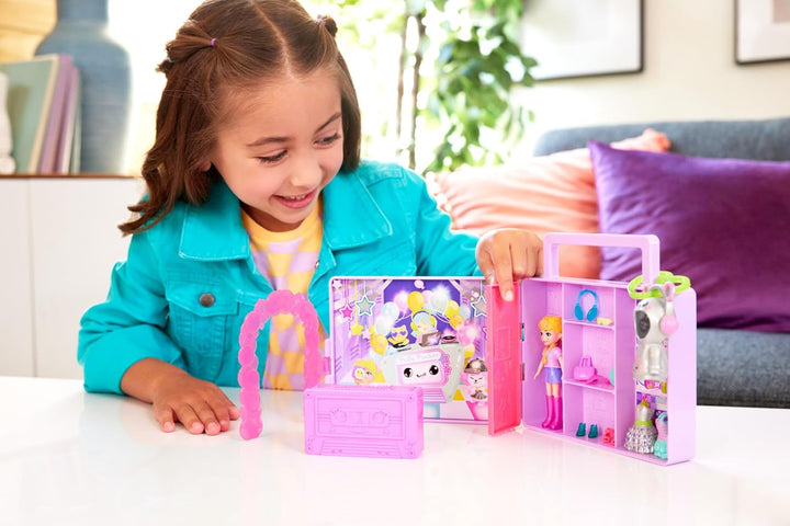 Polly Pocket-Puppe und Spielset, Diskoparty Fashion Reveal, Reisespielzeug zum Auspacken mit ca. 7 c