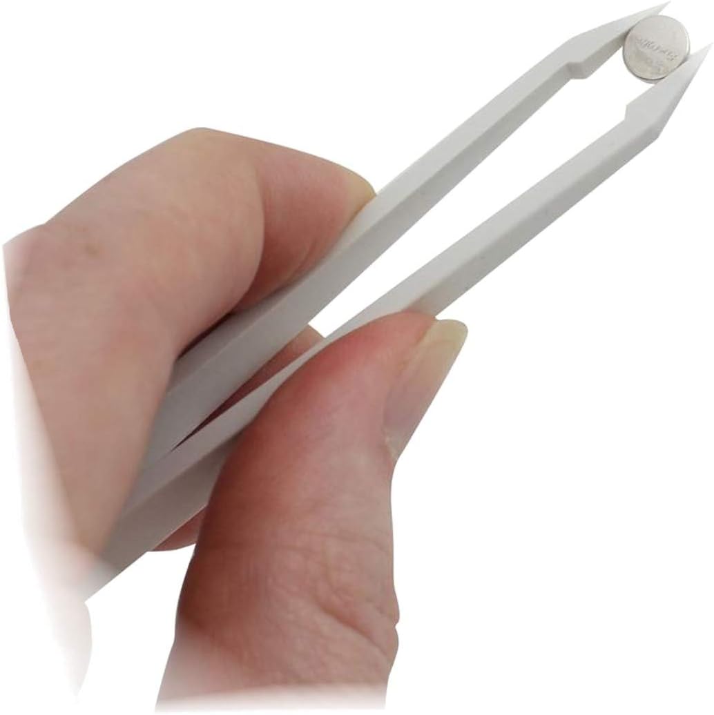 Uhrmacher Profi Batterie Wechsel Pinzette Kunststoff weiss Swiss Made Kornzange