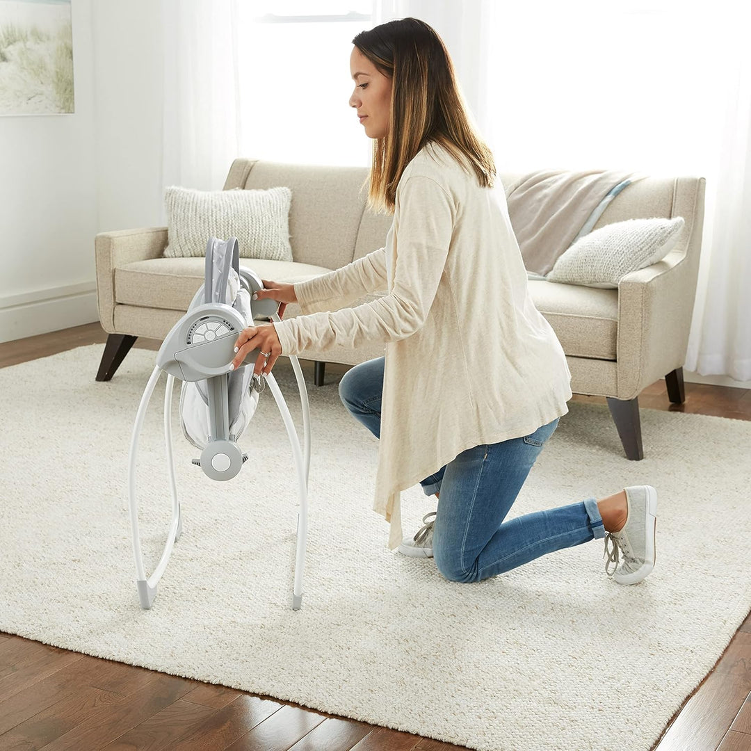 Ingenuity, tragbare Babyschaukel, Cuddle lamp - mit Melodien, Zeit- und Schaukeleinstellung Cuddle