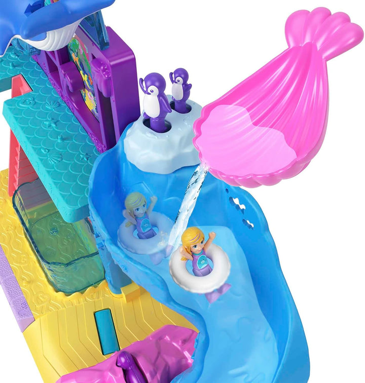 Polly Pocket Pollyville Aquarium mit Shani, Spielset mit 2 Puppen, Spielzeugauto und 11 Zubehörteile
