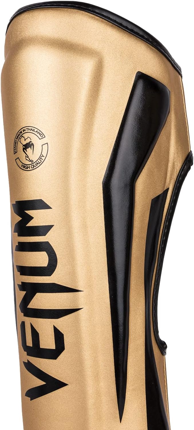 Venum Elite Boxen Schienbeinschutz L Gold/Schwarz, L Gold/Schwarz