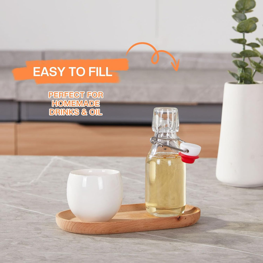 Zanfqvo Glasflaschen 100ml mit Bügelverschluss, 12 Stück Kleine Flaschen Zum Befüllen, Bügelflasche