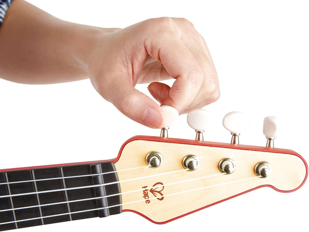 Hape Elektrische Ukulele mit stimmbaren Saiten und Führungslichtern für Kinder ab 3 Jahren, rot