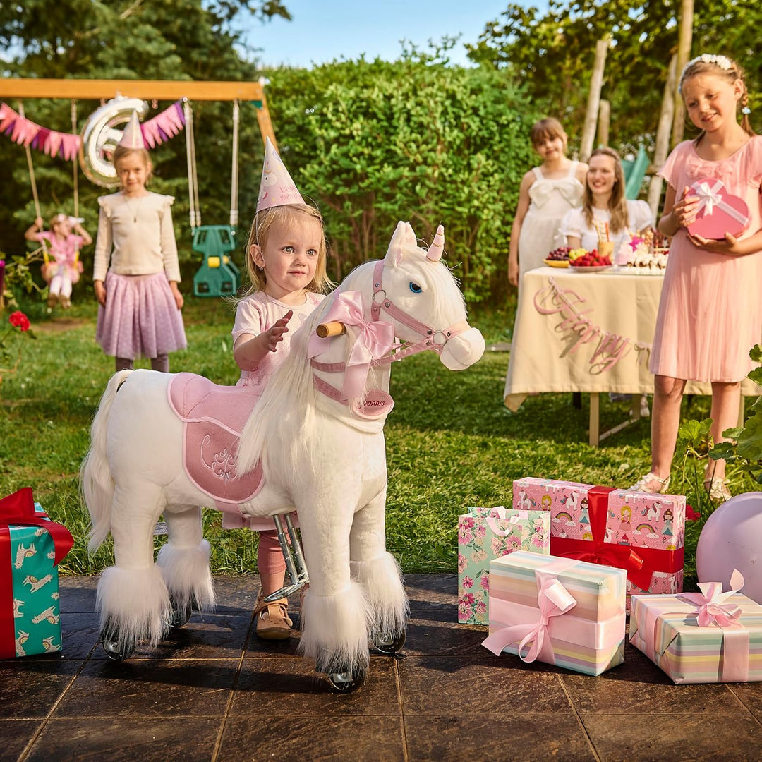 Ponnie Einhorn auf Rollen Merlin - Unicorn M mit rosa Sattel
