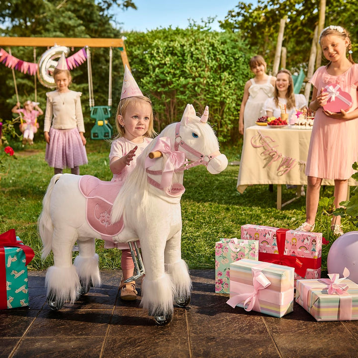 Ponnie Einhorn auf Rollen Merlin - Unicorn M mit rosa Sattel