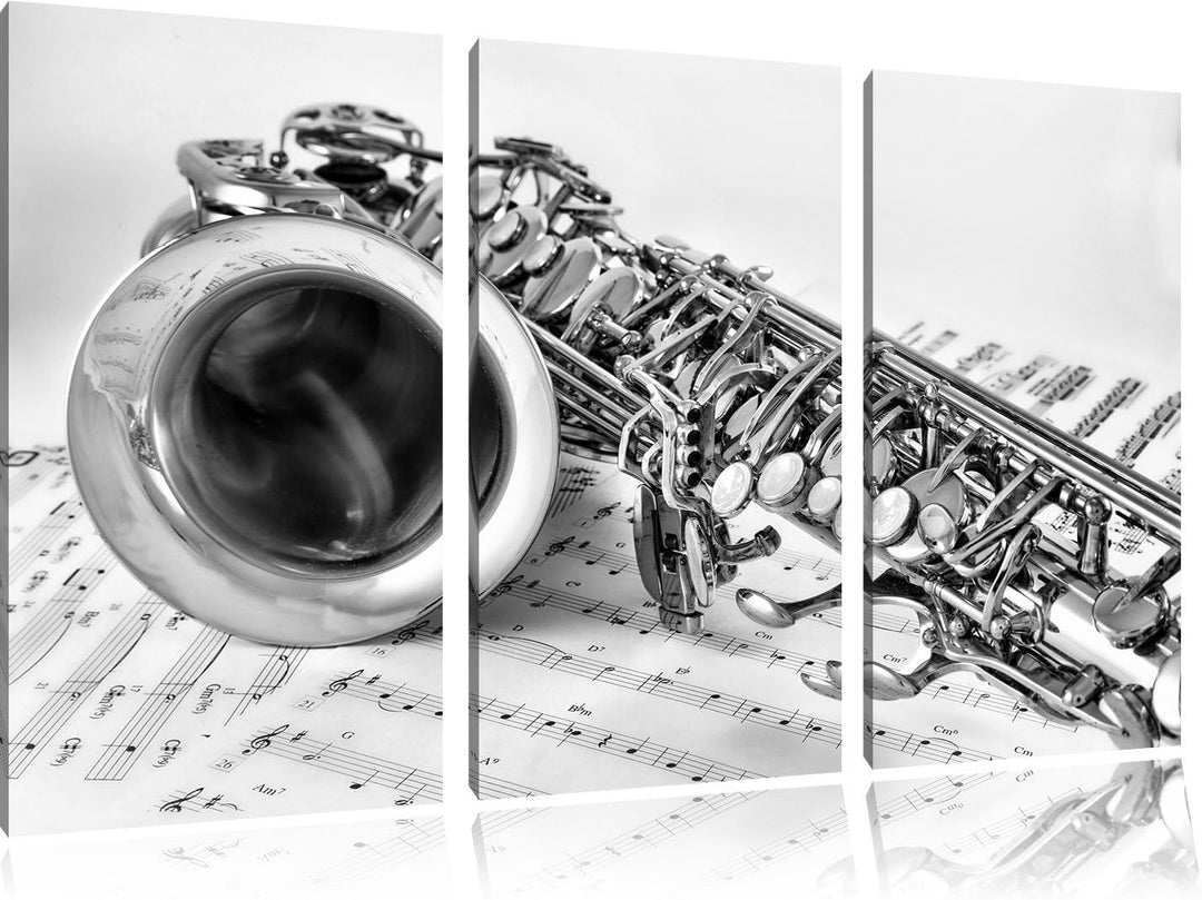 Pixxprint Saxophon auf Notenpapier als Leinwandbild/Grösse: 3 Teilig (120x80 cm) cm/Wandbild/Kunstdr