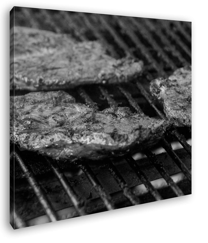 appetitliche Steaks auf dem Grill Format: 70x70 Effekt: Schwarz&Weiss als Leinwandbild, Motiv auf Ec