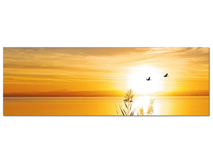Paul Sinus Art Panoramabild auf Leinwand und Keilrahmen 150x50cm See Gräser Vögel Sonnenuntergang