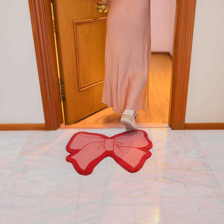 Fisura – Originelle Kokosfussmatte Rosa Schleife“ mit Rutschfester PVC-Unterseite. Rosa und rote Tür