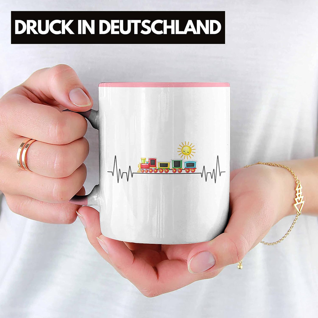 Trendation - Zug Züge Herzschlag Tasse Geschenk für Eisenbahner Zugführer Hobby Geschenkidee (Rosa),