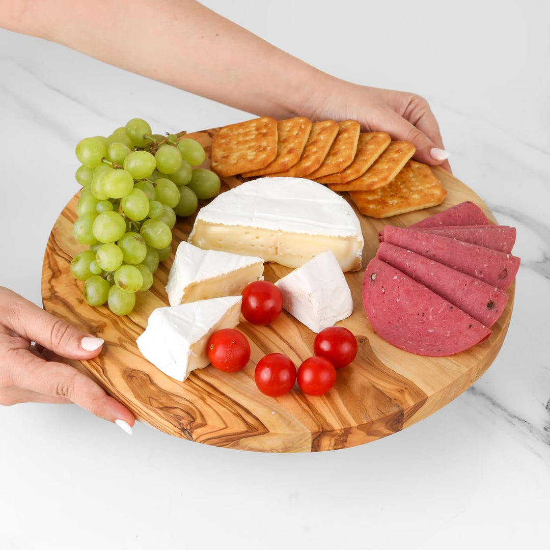Handgefertigtes rundes Paddelbrett aus Olivenholz – gestreiftes Servierbrett für Käse, Brot und Vors