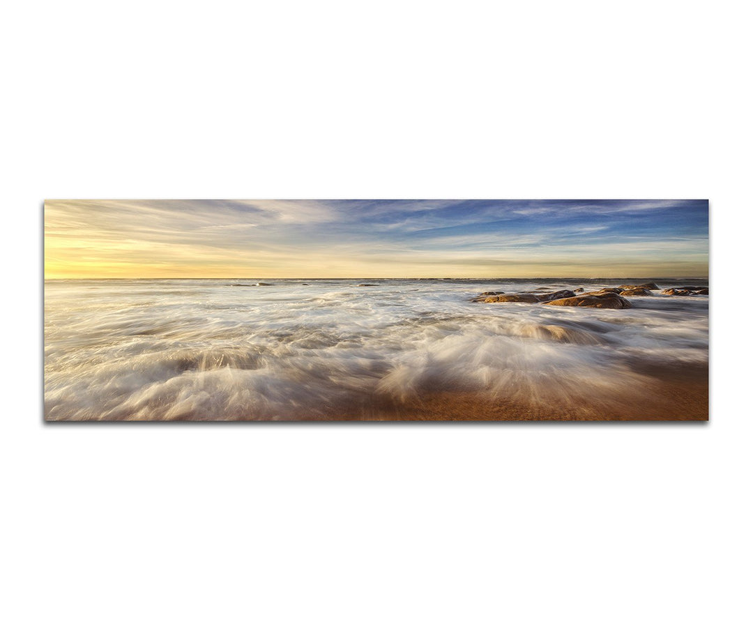 Paul Sinus Art Panoramabild auf Leinwand und Keilrahmen 150x50cm Meer Wellen Steine Wolkenschleier