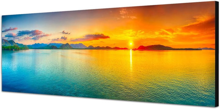 Paul Sinus Art Panoramabild auf Leinwand und Keilrahmen 150x50cm Meer Hügel Sonnenaufgang Wolkenschl
