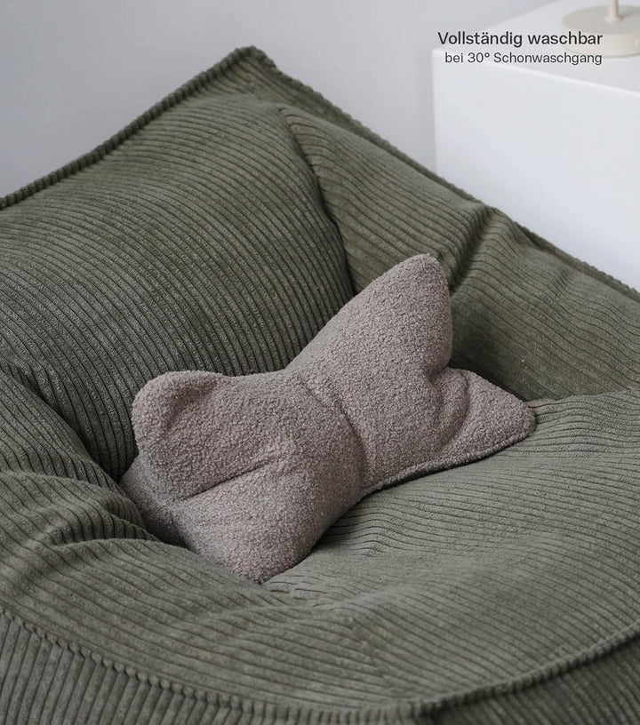 mokebo Lesekissen aus weichen Bouclé-Stoff 'Der Leseknochen', ergonomisches Nackenkissen aus gemütli