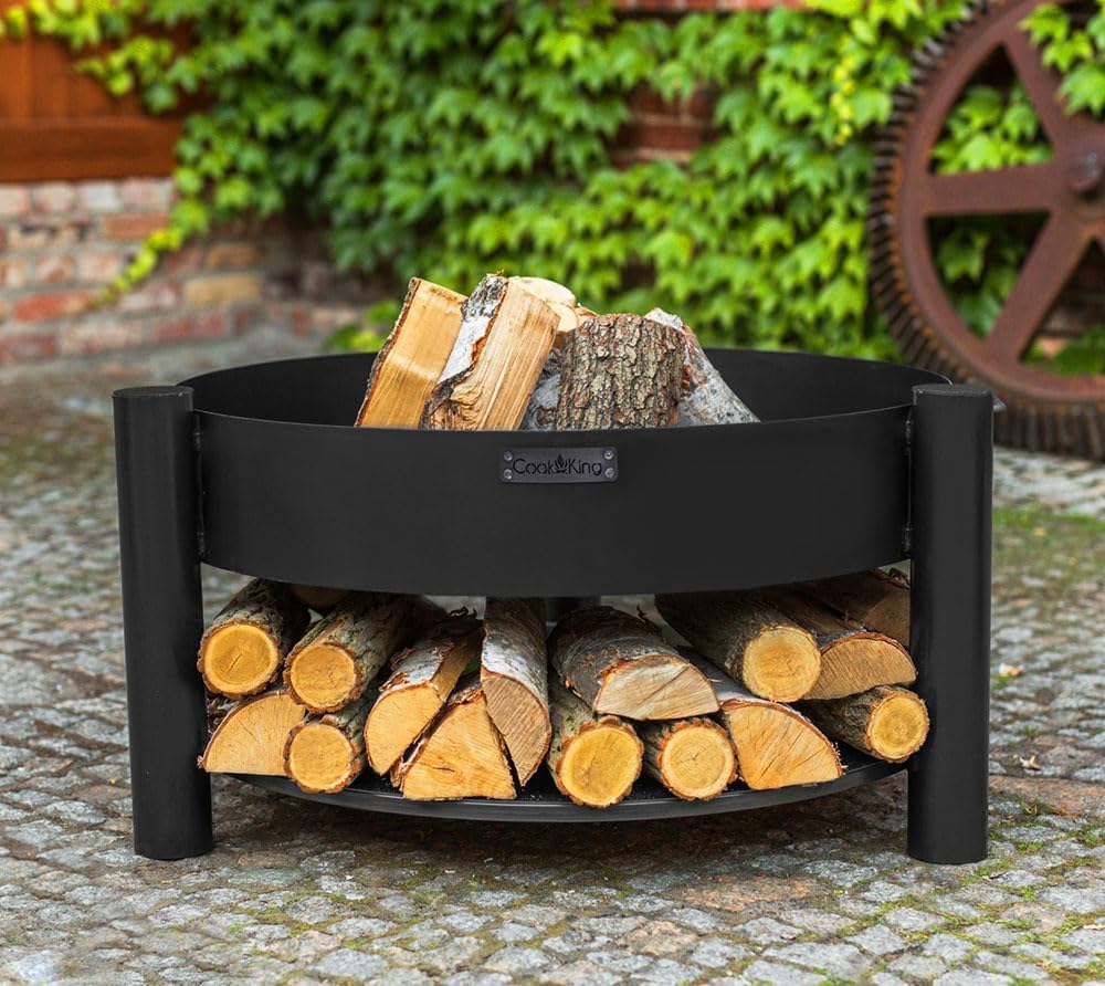 CookKing Stahl Feuerschale Montana | Ø 88x45 cm, Schwarz, Inkl. Holzlager | Robust &amp; Windgeschützt |