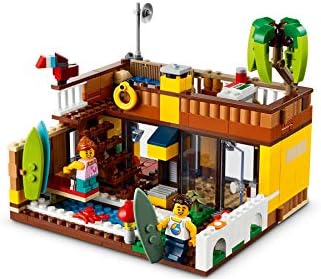 LEGO 31118 Creator 3-in-1 Surfer-Strandhaus, mit Leuchtturm, Poolhaus, Tier-Figuren wie Delfin und S