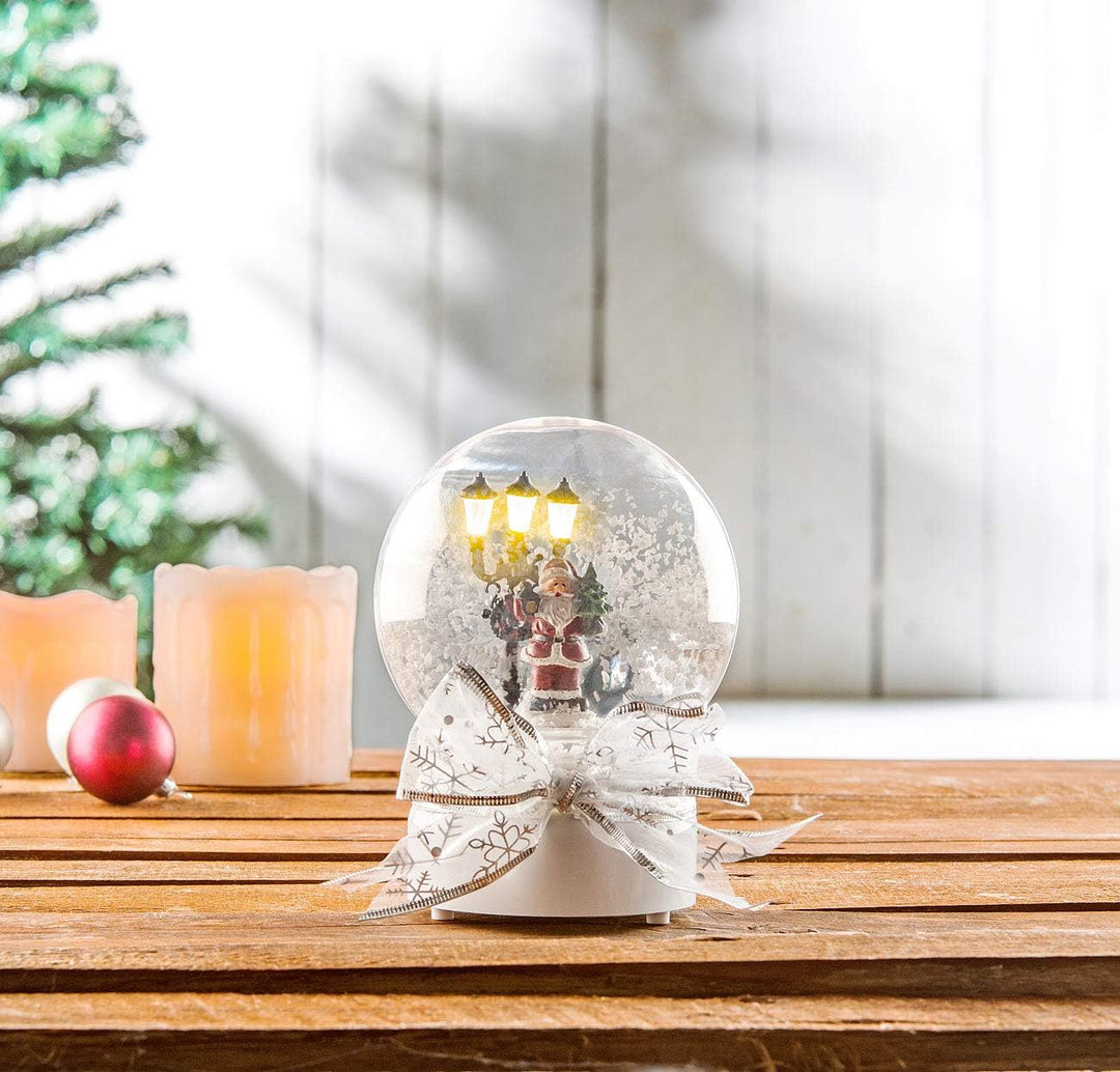 infactory Schneekugel: 2er-Set Schneekugeln mit singendem Weihnachtsmann, LED-Laterne (Schneekugel W