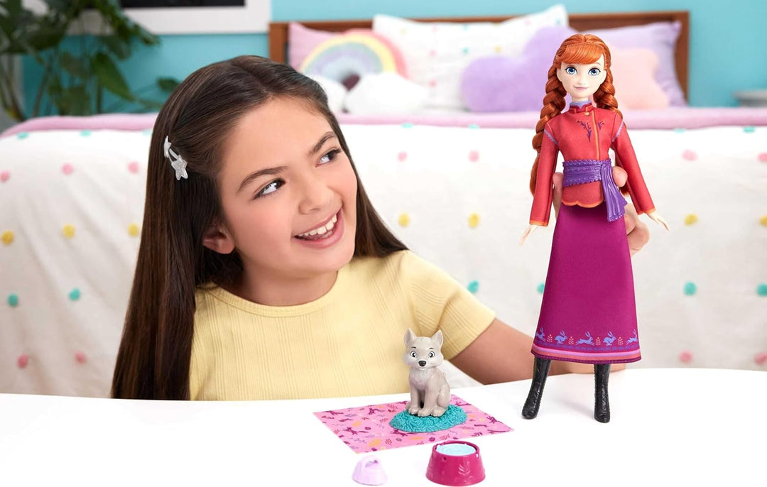 Mattel Disney Die Eiskönigin Anna-Modepuppe und Wolfsjunges-Figur mit 4 Zubehörteilen, einschliessli