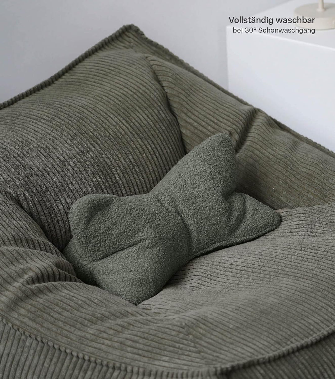 mokebo Lesekissen aus weichen Bouclé-Stoff 'Der Leseknochen', ergonomisches Nackenkissen aus gemütli