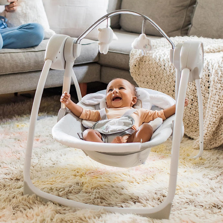 Ingenuity, tragbare Babyschaukel, Cuddle lamp - mit Melodien, Zeit- und Schaukeleinstellung & Ansman