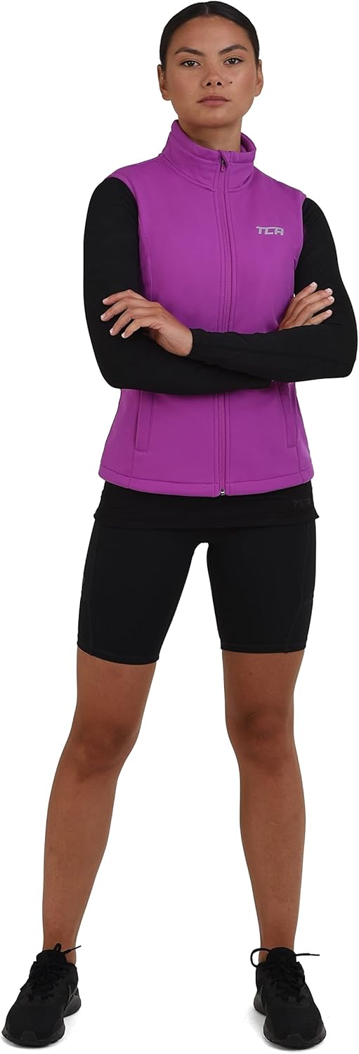 TCA Damen Flyweight winddichte Lauf- und Fahrradweste mit Reissverschlusstaschen, Violett