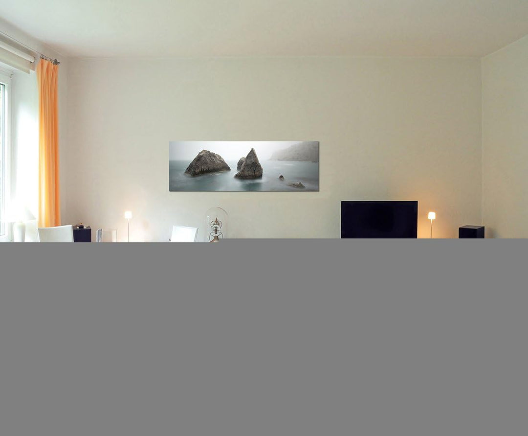 Paul Sinus Art Panoramabild auf Leinwand und Keilrahmen 150x50cm Meer Morgendämmerung Nebel Felsen