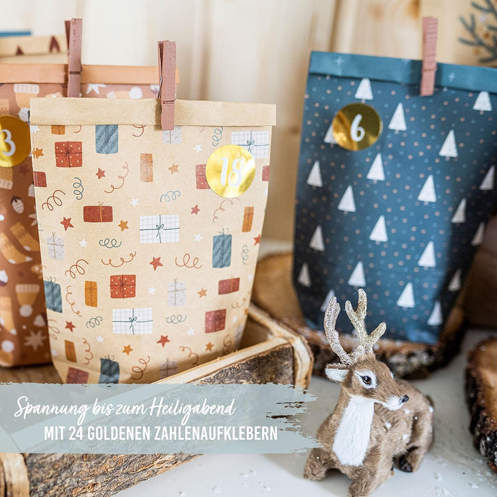 Papierdrachen Adventskalender 2025 zum Befüllen - 24 braune & petrolfarbene bedruckte Geschenktüten