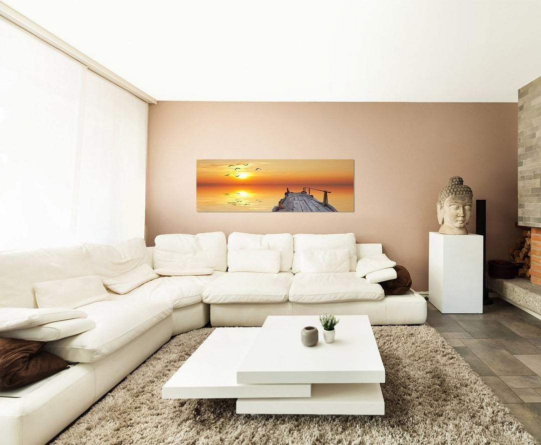 Paul Sinus Art Panoramabild auf Leinwand und Keilrahmen 150x50cm Wasser Holzsteg Seevögel Sonnenunte