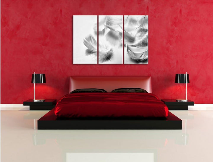 Pixxprint Weisse Feder auf schwarzem Stein als Leinwandbild/Grösse: 3 Teilig (120x80) cm/Wandbild/Ku