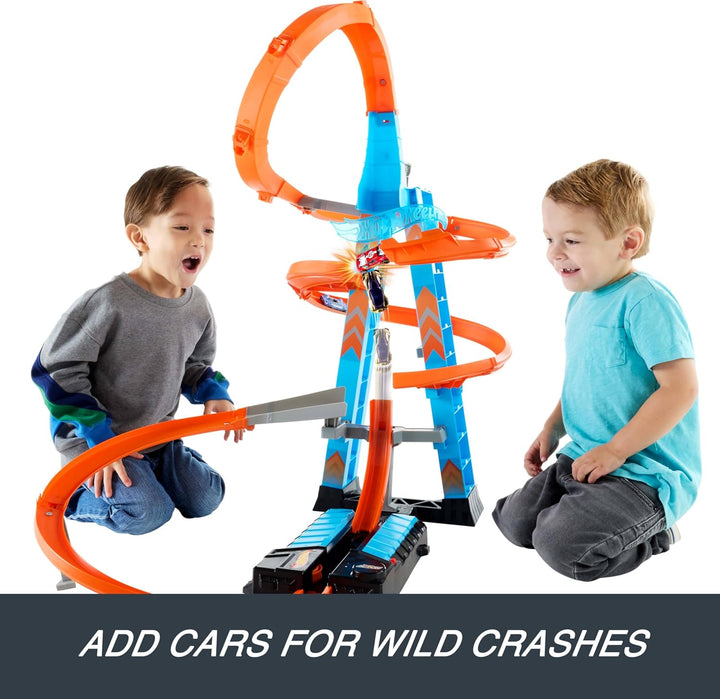 Hot Wheels GWT39 - Himmelscrash-Turm, 60cm hoch mit batteriebetriebenem Beschleuniger und orangem Tr