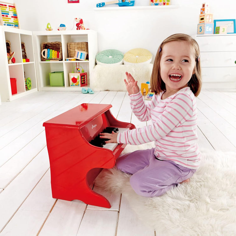 Hape Spielzeug-Klavier | Mit 18 Tasten, Musikinstrument für Kinder aus Holz, Rot