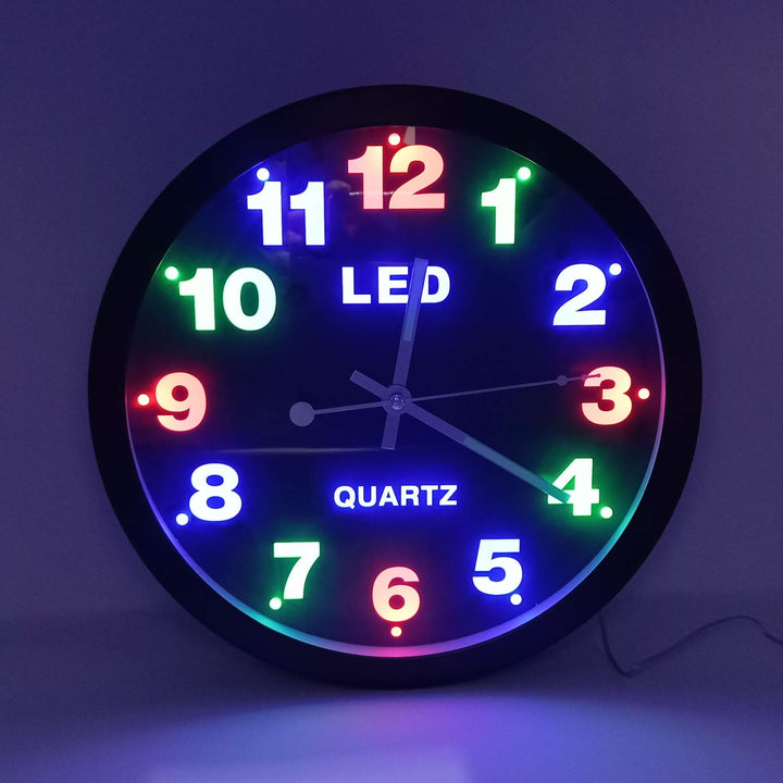 Starlet24 Wanduhr 29,5cm Ø beleuchtet mit bunter LED-Zifferbeleuchtung und Quarz-Uhrwerk (laufruhig,