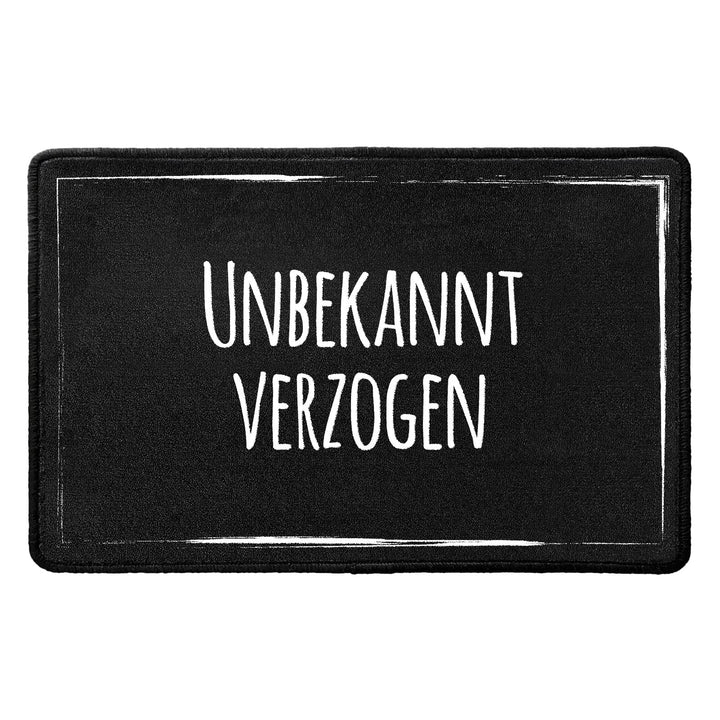 Pechkeks Fussmatte mit Spruch „Unbekannt verzogen. “ (Grösse 67x43 cm; rutschfest, waschbar, schwarz