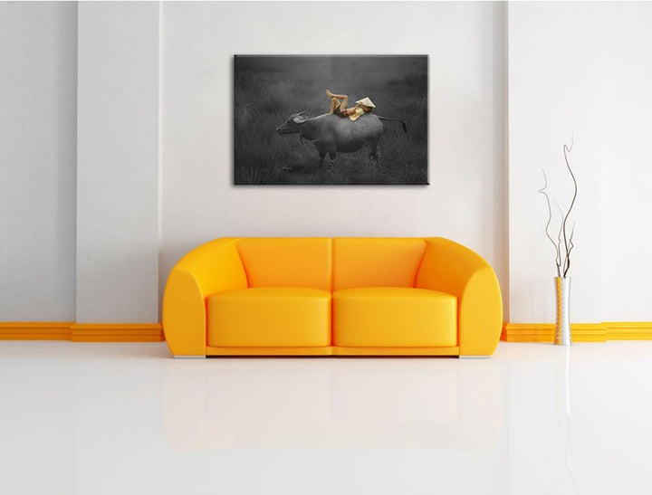 liegendes Kind auf Wasserbüffel schwarz/weiss Format: 100x70 auf Leinwand, XXL riesige Bilder fertig